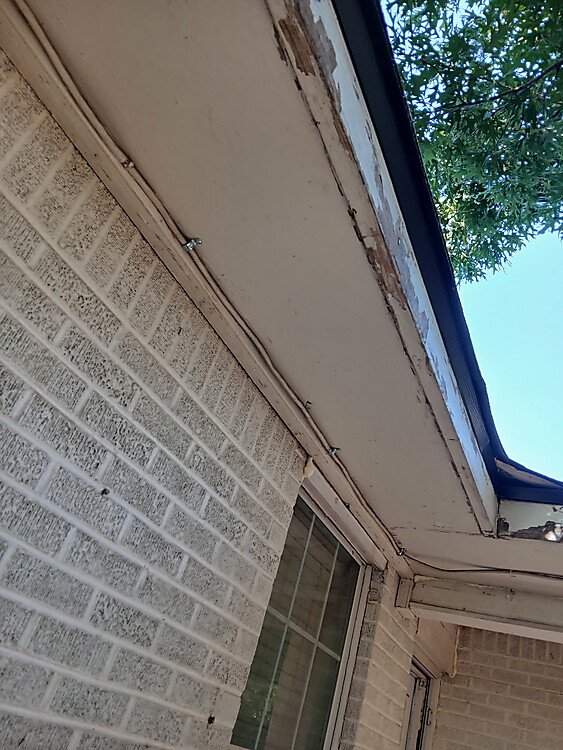 Before - damaged soffit and fascia